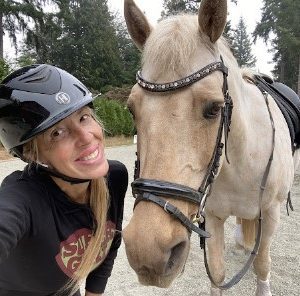 Ursula posing with her horse.